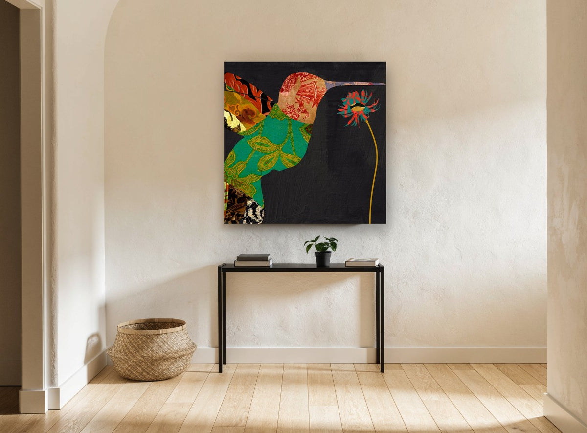 Patchwork Hummingbird at Bloom floral canvas print on the wall of a hallway