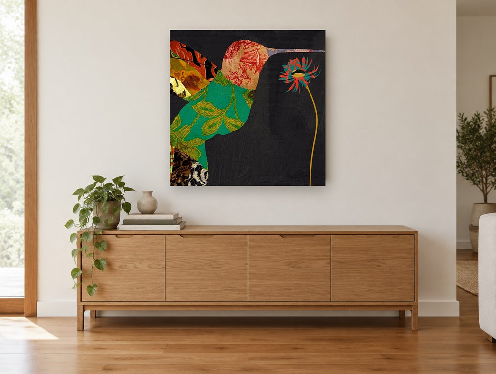 Patchwork Hummingbird at Bloom floral canvas print on the wall of a living room above a sideboard