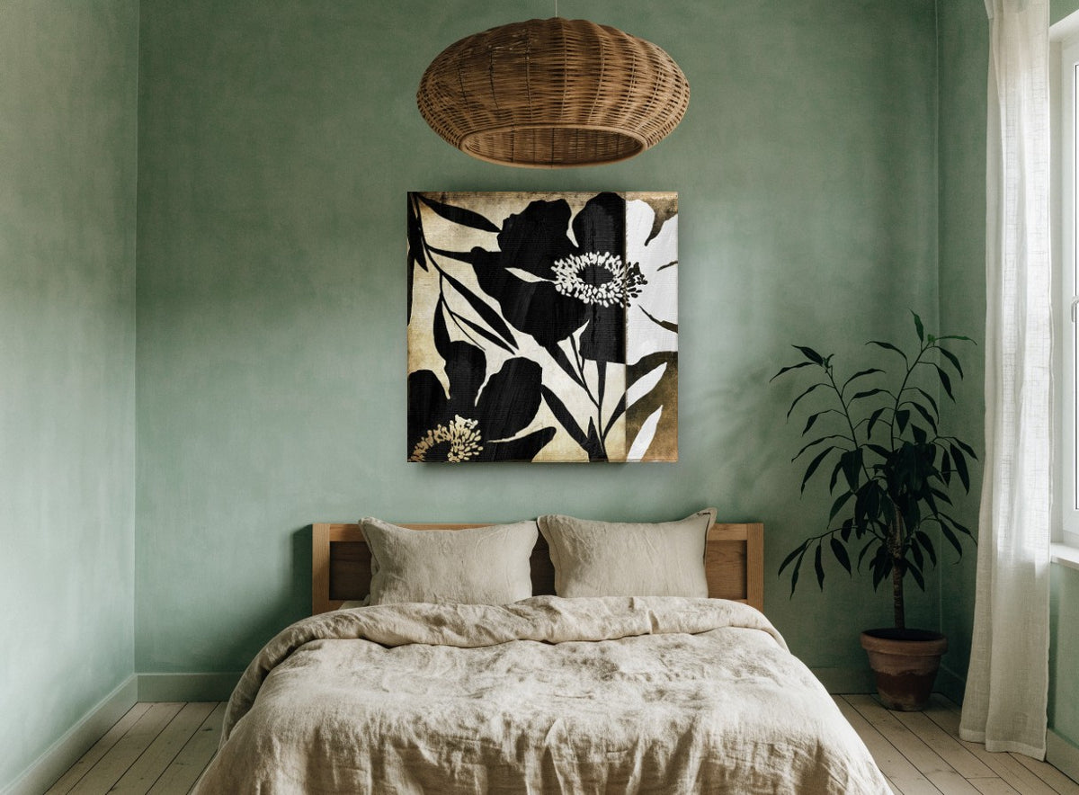 Black Poppy Silhouettes floral canvas print on the wall of a bedroom