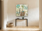 Poppy and Nest Collage floral canvas print on the wall of a hallway