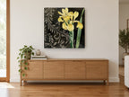 Yellow Iris Scrollwork floral canvas print on the wall of a living room above a sideboard