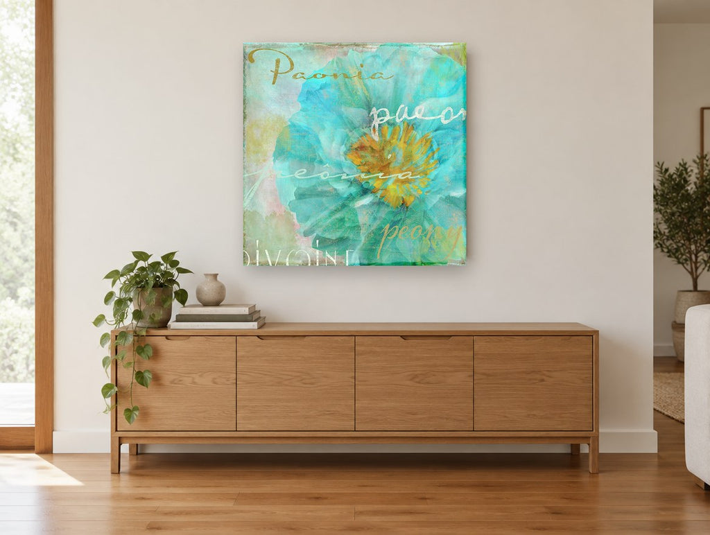 Aqua Peony Script floral canvas print on the wall of a living room above a sideboard