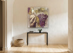 Vineyard Bottle and Grapes floral canvas print on the wall of a hallway