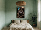 Owl Beneath the Teal Moon animal canvas print on the wall of a bedroom