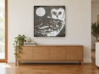 Moonlit Woodgrain Owl animal canvas print on the wall of a living room above a sideboard