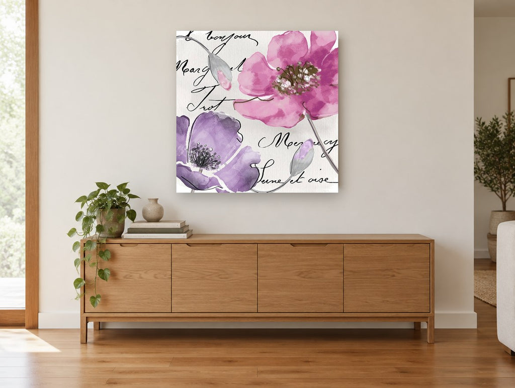 Pink and Lilac Script Poppies floral canvas print on the wall of a living room above a sideboard