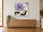 Lilac Bloom Script floral canvas print on the wall of a living room above a sideboard