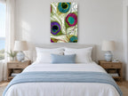 Jewelled Peacock Plumes animal canvas print on the wall of a bedroom