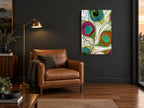 Peacock Eye Swirl animal canvas print on the wall of a charcoal living room