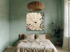 Ivory Gerbera Flourish floral canvas print on the wall of a bedroom