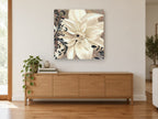Ivory Bloom Scrollwork floral canvas print on the wall of a living room above a sideboard