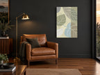 Layered Leaf Panels floral canvas print on the wall of a charcoal living room