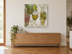 White Wine Cellar Script floral canvas print on the wall of a living room above a sideboard