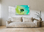 Aqua Poppy Bloom floral canvas print on the wall of a living room