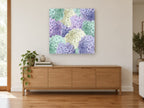 Hydrangea Patchwork Pastels floral canvas print on the wall of a living room above a sideboard