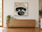 Rotary Telephone Ledger vintage canvas print on the wall of a living room above a sideboard