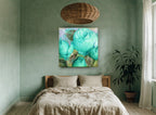 Aqua Rose Bloom floral canvas print on the wall of a bedroom