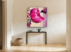 Magenta Poppy and Butterfly floral canvas print on the wall of a hallway