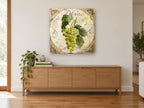 Blanc Grape Cluster kitchen canvas print on the wall of a living room above a sideboard