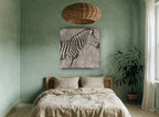 Zebra in the Reeds animal canvas print on the wall of a bedroom