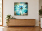 Blue Poppy Script floral canvas print on the wall of a living room above a sideboard