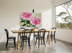 Twin Pink Peonies floral canvas print on the wall of a dining room