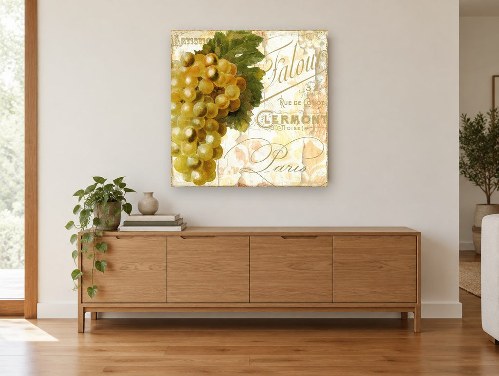 Golden Grapes Paris Script kitchen canvas print on the wall of a living room above a sideboard