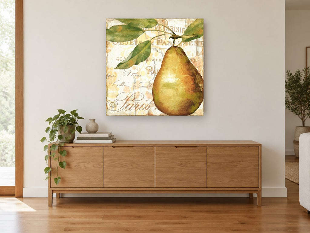 Golden Pear Paris kitchen canvas print on the wall of a living room above a sideboard