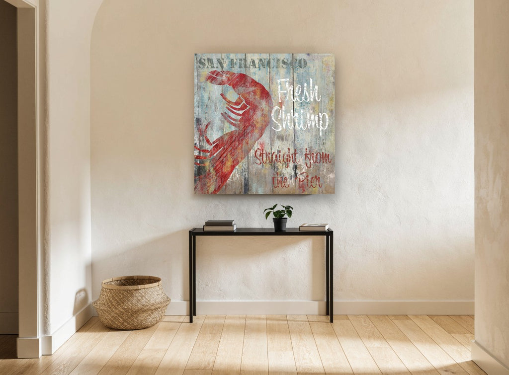 Fresh Shrimp Pier Sign coastal canvas print on the wall of a hallway
