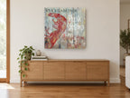 Fresh Shrimp Pier Sign coastal canvas print on the wall of a living room above a sideboard