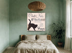 Chat Noir Paris Sign animal canvas print on the wall of a bedroom