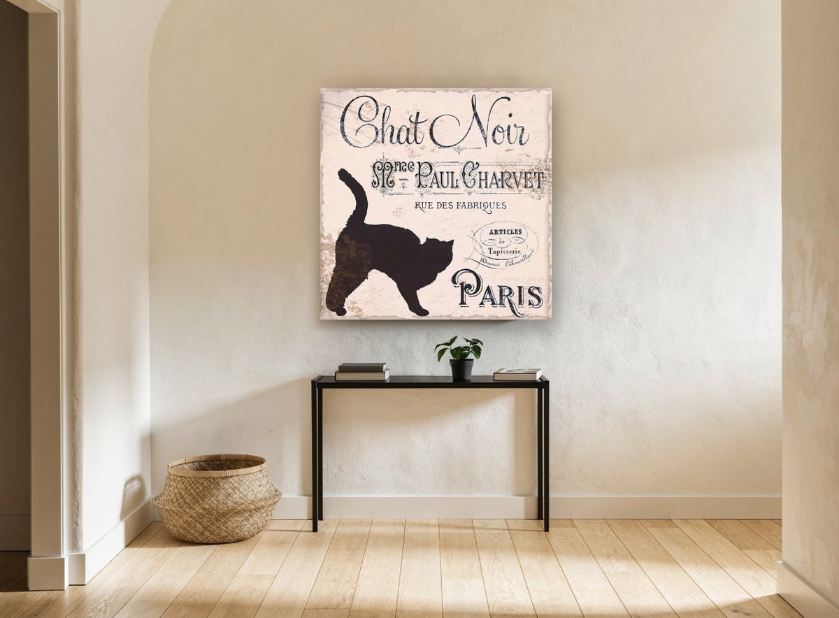 Chat Noir Paris Sign animal canvas print on the wall of a hallway
