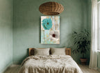 Teal and White Poppies floral canvas print on the wall of a bedroom