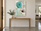 Teal and White Poppies floral canvas print on the wall of a entry hall
