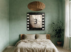 Film Countdown Three vintage canvas print on the wall of a bedroom