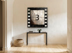 Film Countdown Three vintage canvas print on the wall of a hallway
