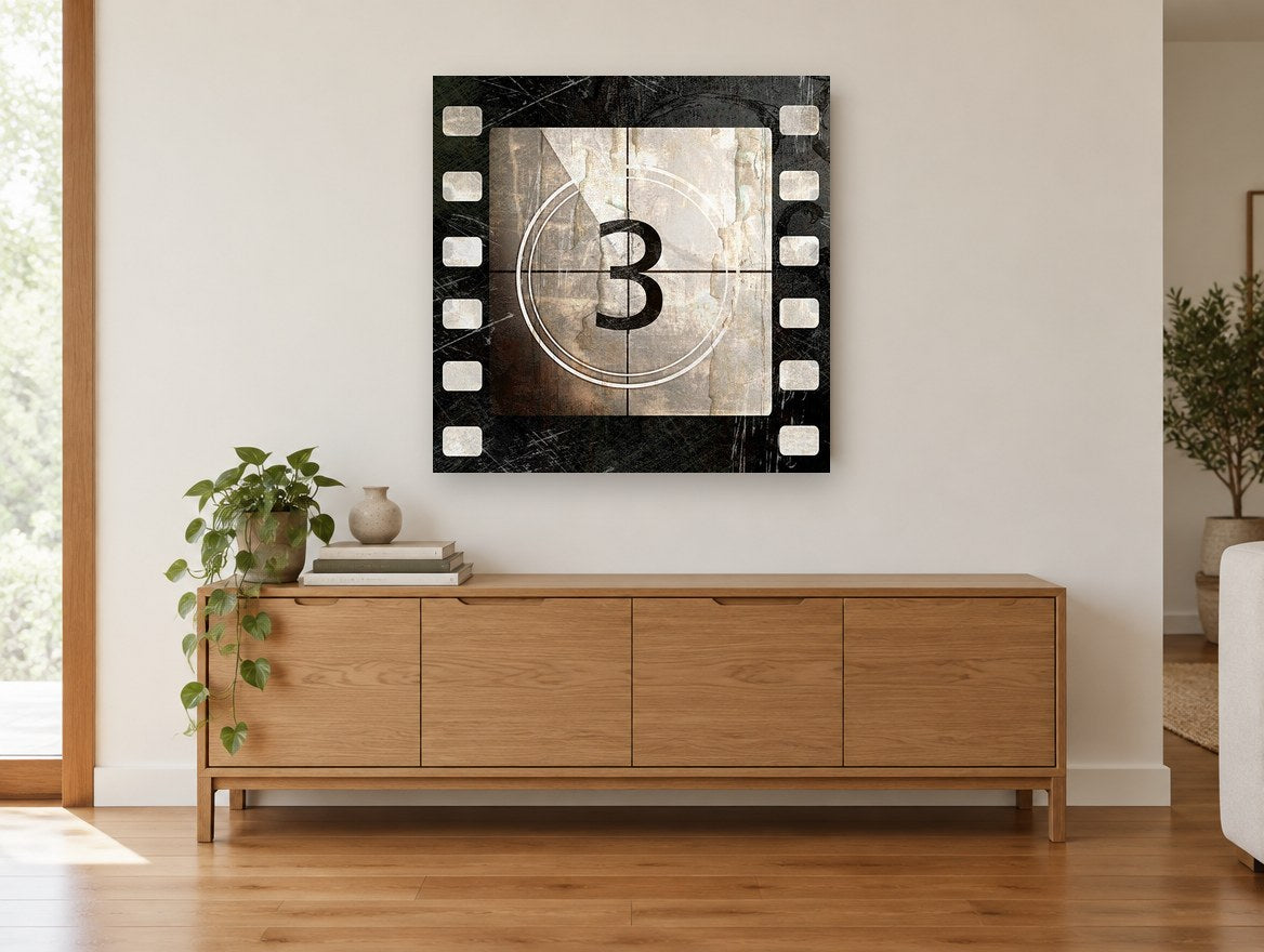 Film Countdown Three vintage canvas print on the wall of a living room above a sideboard