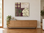 Bliss Rose Damask floral canvas print on the wall of a living room above a sideboard