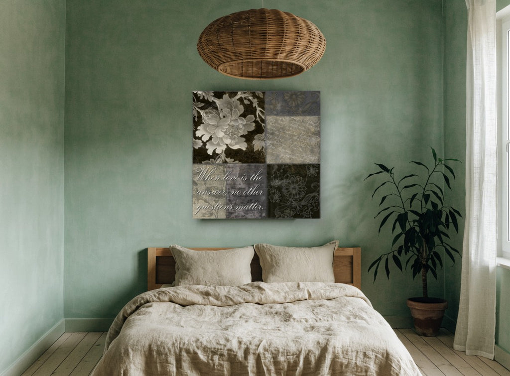 Love Is The Answer Patchwork floral canvas print on the wall of a bedroom