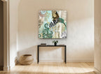 Patchwork Hummingbird Damask floral canvas print on the wall of a hallway