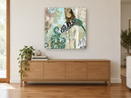 Patchwork Hummingbird Damask floral canvas print on the wall of a living room above a sideboard