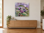 Toscano Olive Branch kitchen canvas print on the wall of a living room above a sideboard