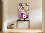 Cobalt and Crimson Blooms floral canvas print on the wall of a hallway