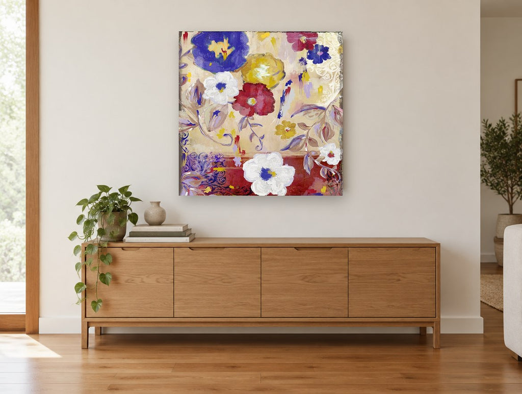 Sevilla Garden Blooms floral canvas print on the wall of a living room above a sideboard