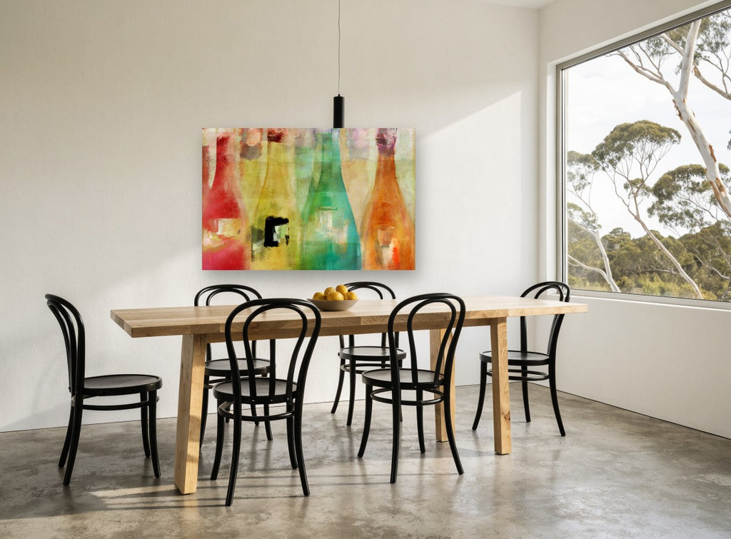 Four Coloured Bottles kitchen canvas print on the wall of a dining room