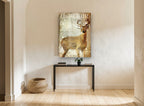 Snowfall Buck animal canvas print on the wall of a hallway