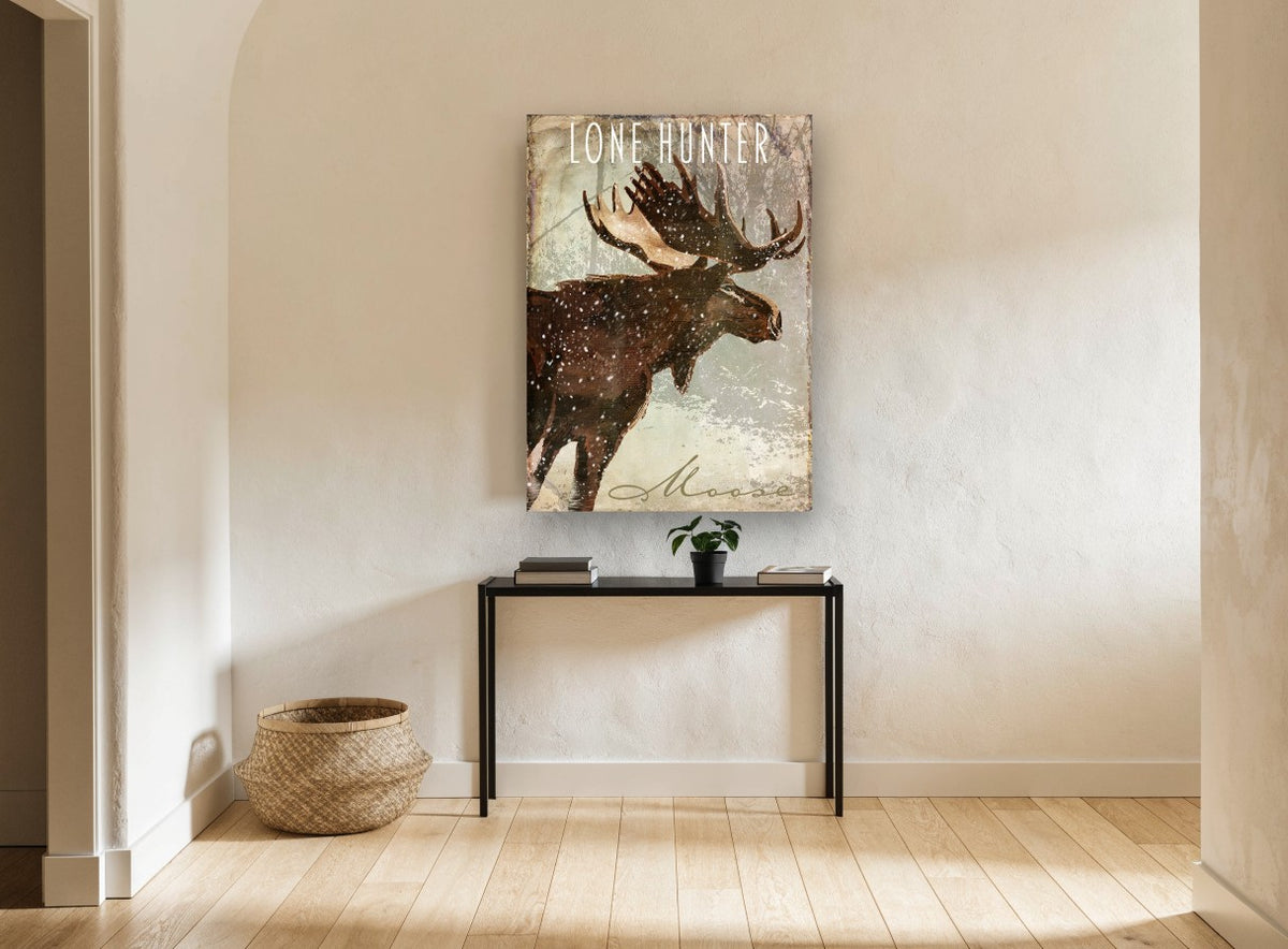 Snowfall Moose animal canvas print on the wall of a hallway
