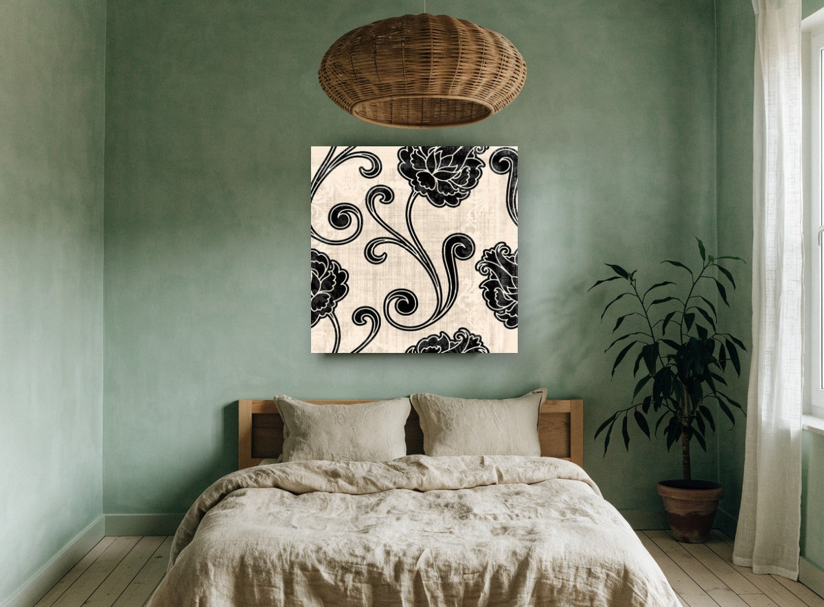 Black Peony Scrolls floral canvas print on the wall of a bedroom