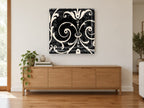 Cream Scroll Damask floral canvas print on the wall of a living room above a sideboard
