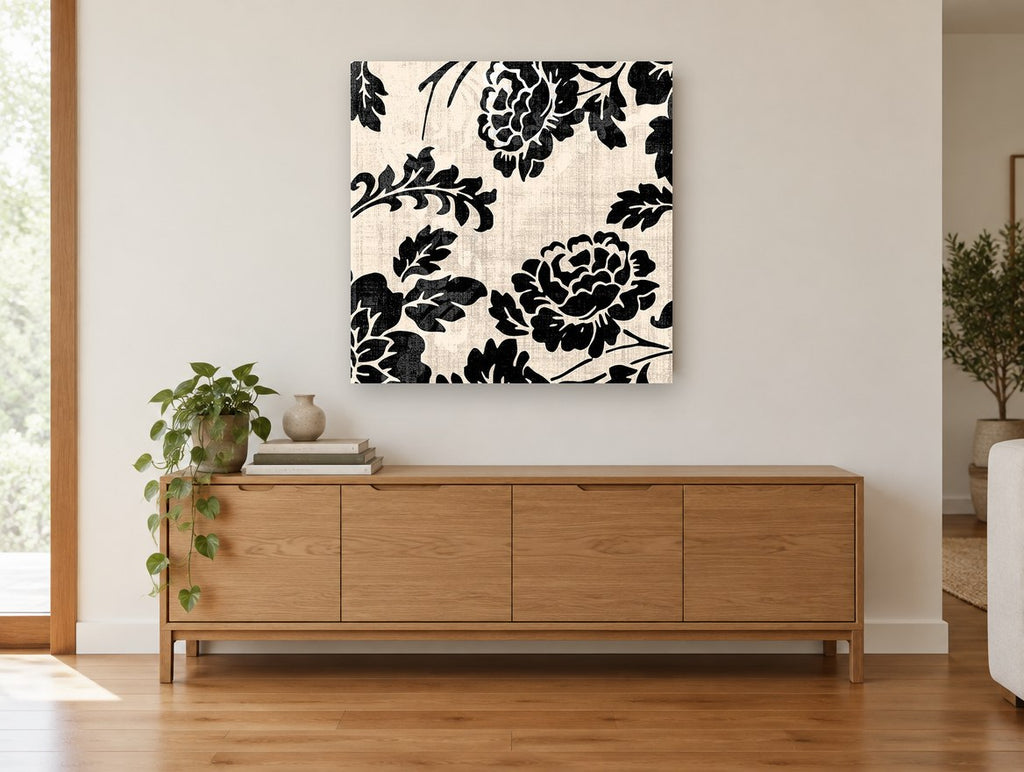 Black Damask Roses floral canvas print on the wall of a living room above a sideboard